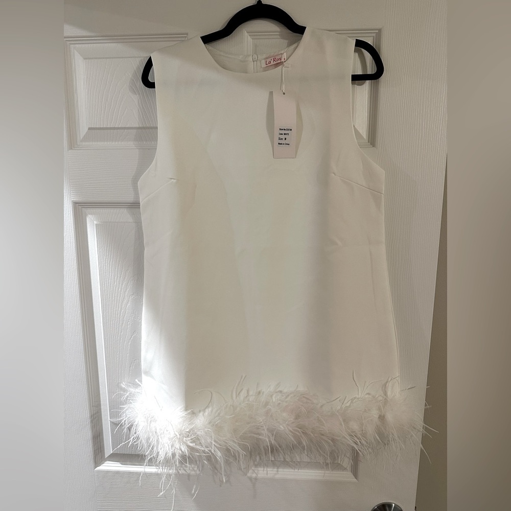 La Ros Mini White Dress with feather trim size medium!